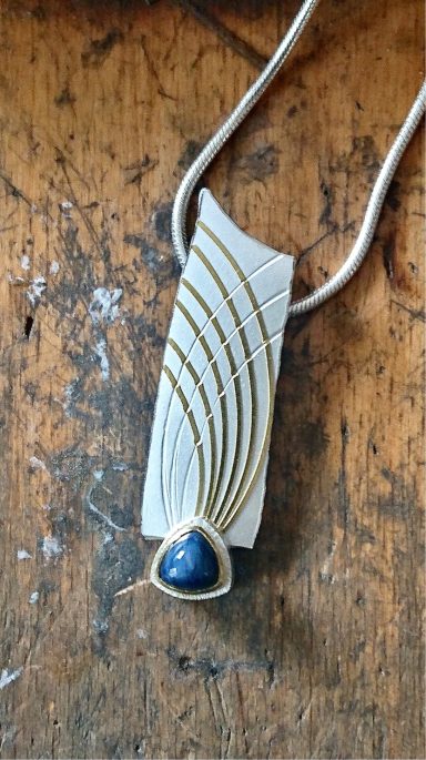 Anhänger in 925 Silber und 900 Gold mit Saphir